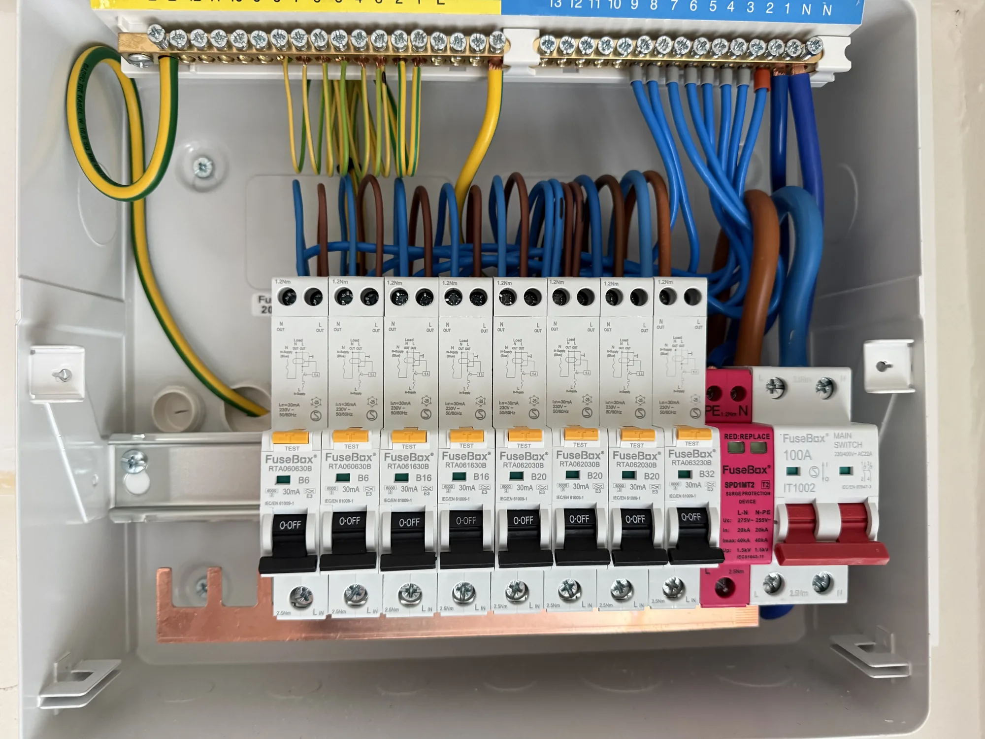Electrician upgrading a fuse board